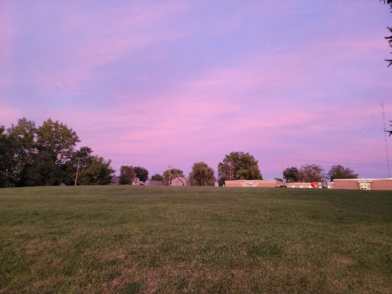 First the sky was a deep pinkish purple color away from the sun as it was setting.