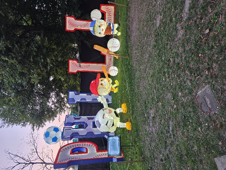 This photo shows an illuminated baseball themed display at the Chinese Lantern Festival
