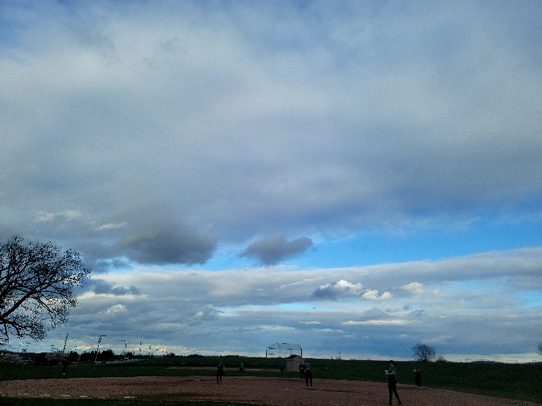 This picture shows low clouds and blue sky in between the clouds..