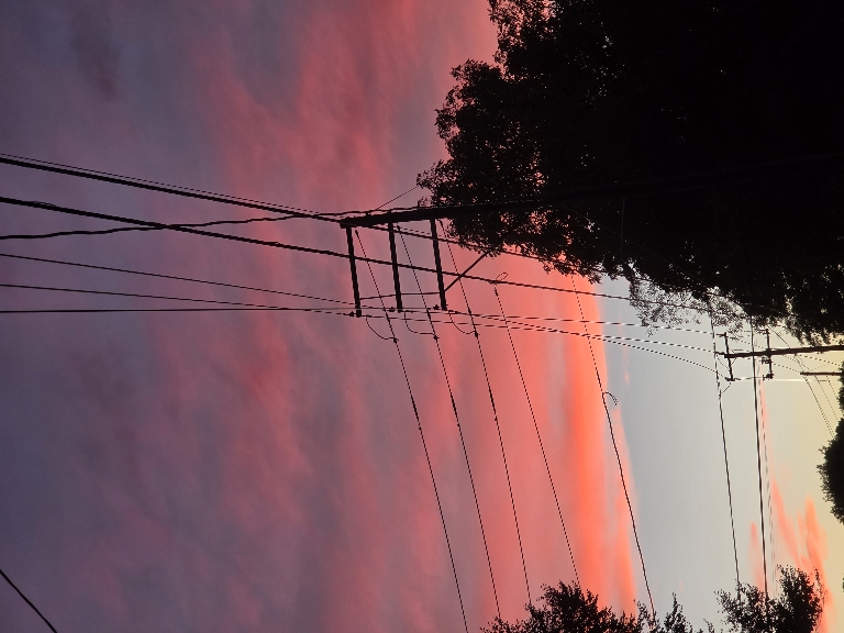 Here is a photo of some very brightly colored clouds just after sunset. There are oranges, pinks, and purples.