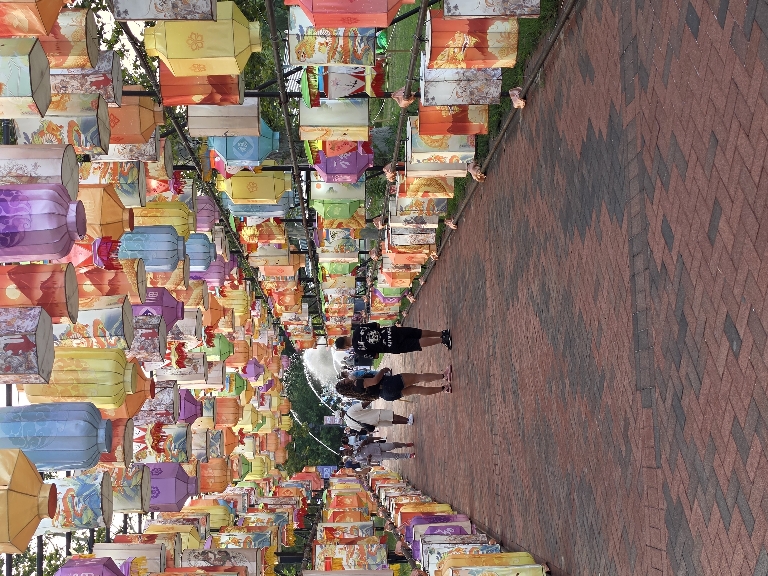 This is a picture of the illuminated tunnel that you walked under. It was very colorful.