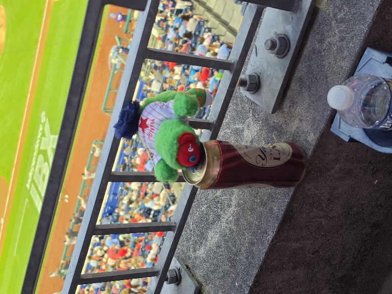 Little Phanatic with his head deep in a beer.