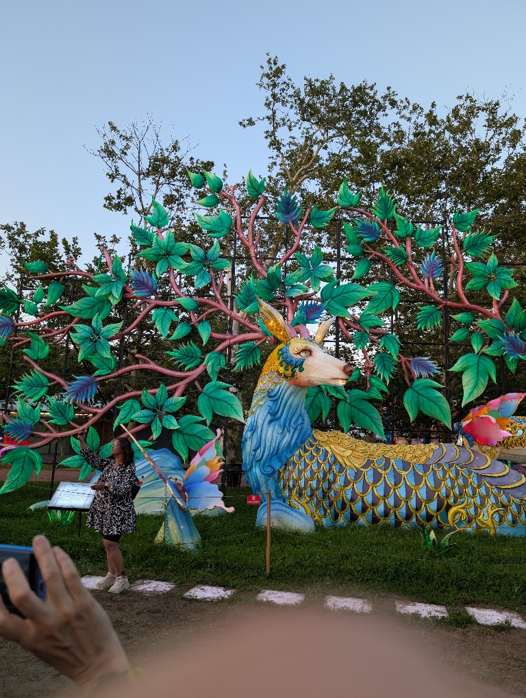 This picture shows what appears to be a partially illumated deer. It wasn't dark yet.