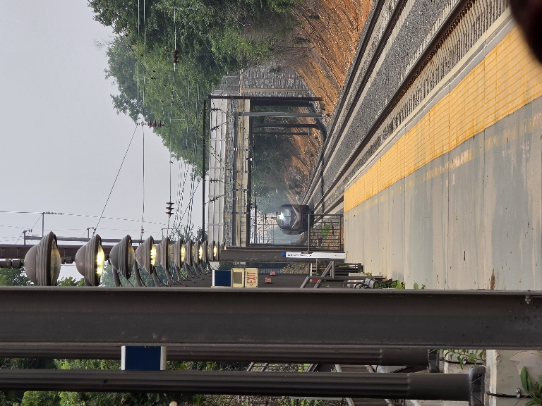 This picture shows an AMTRAK Keystone train approaching from a distance in the smog from the wildfires..