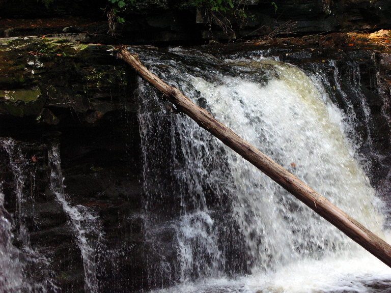 This photo is of a fairly wide and low waterfall..